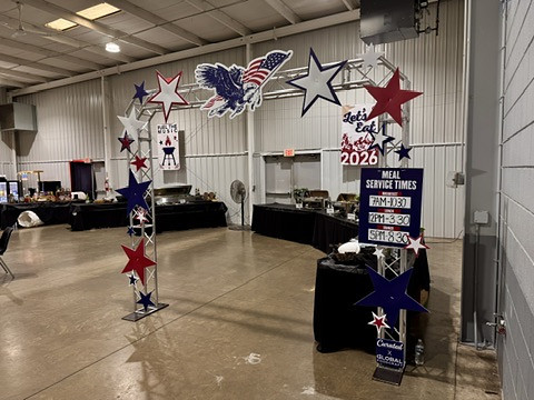 Contour-cut stars, eagle and a meal service board installed for a catered event